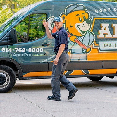 Apex Plumbing Technician Waving